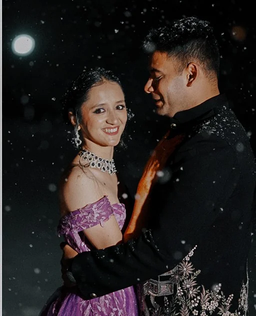 Couple posing stylishly during their engagement shoot.
