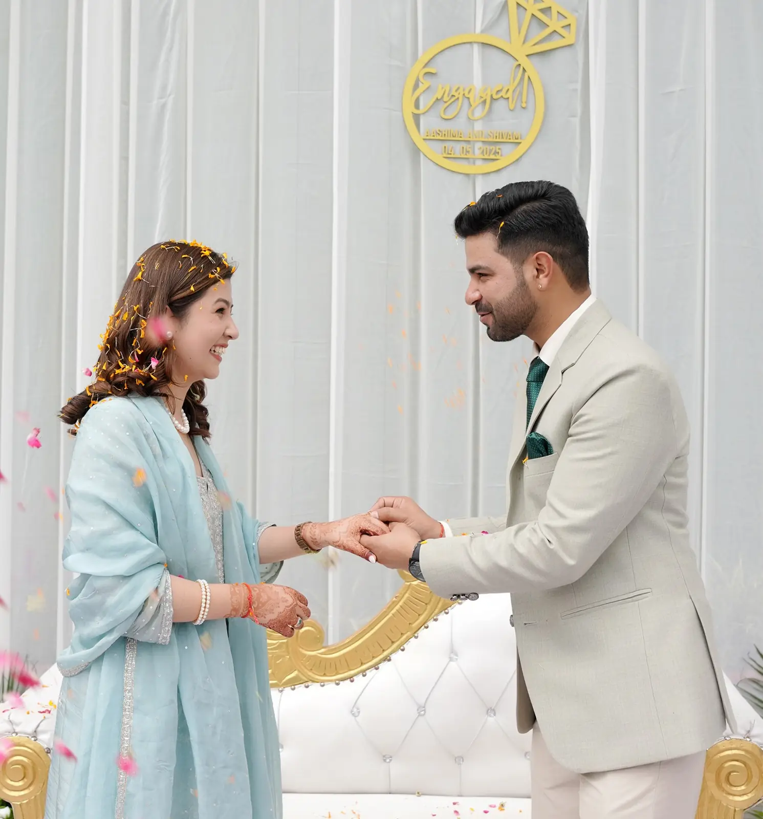 Engagement shoot portrait with couple in coordinated attire