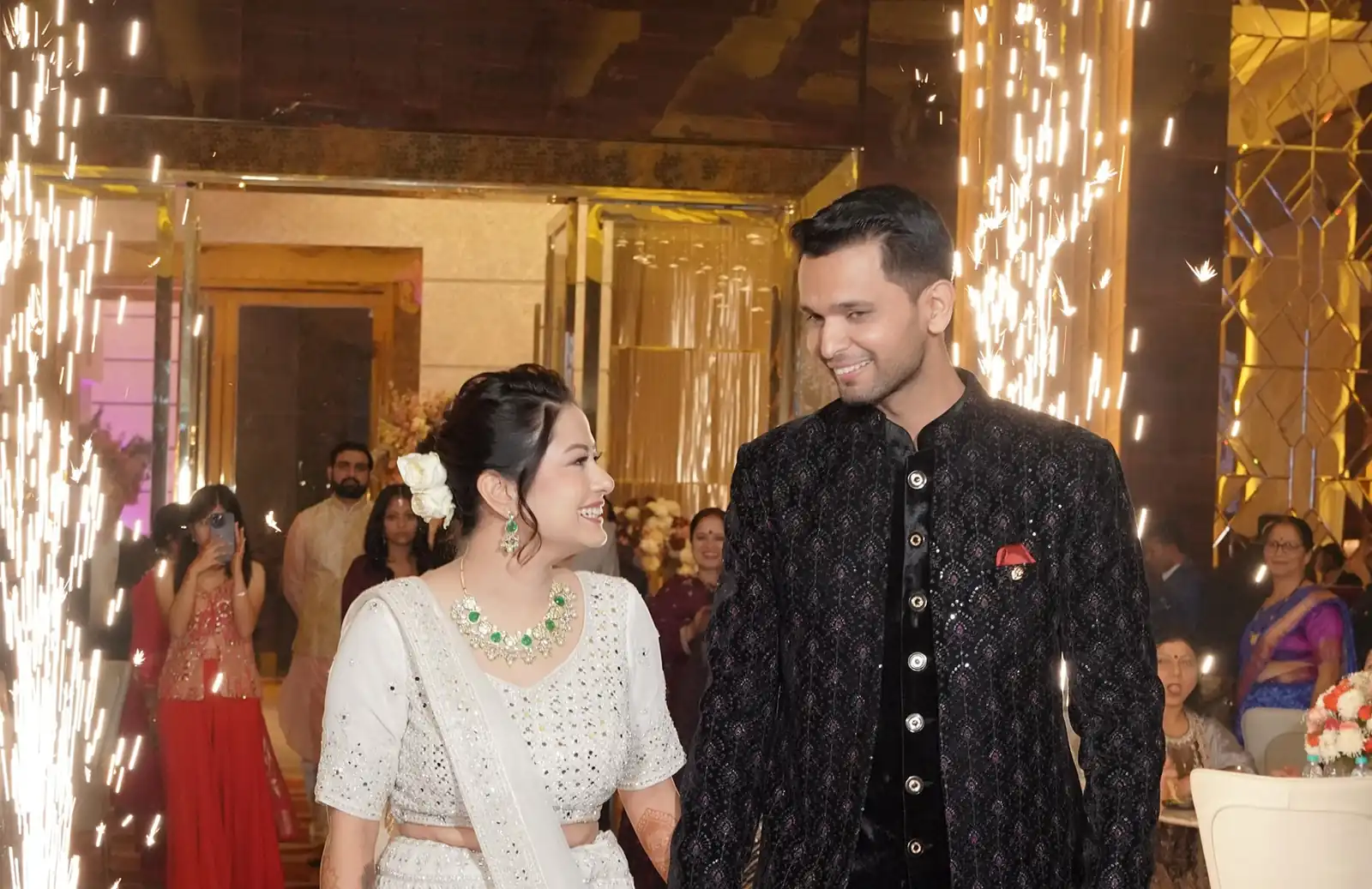 Fun, smiling photograph of at their pre-wedding shoot.