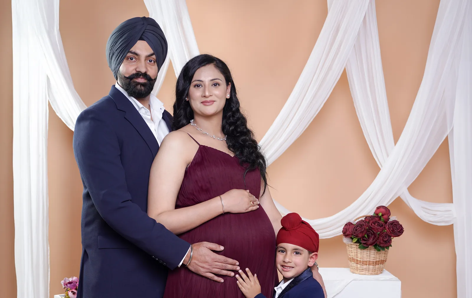 Beautiful pregnant woman posing during maternity shoot