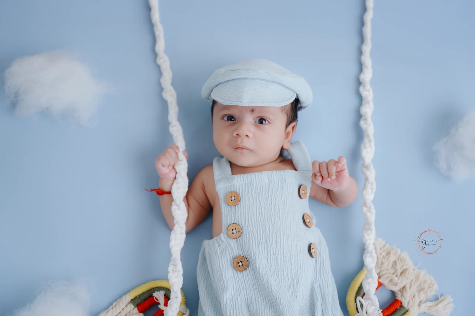 Newborn baby peacefully sleeping during photoshoot session