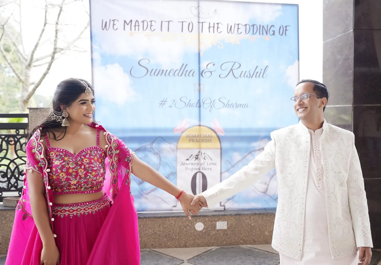 Bride and groom posing elegantly during their wedding photoshoot.