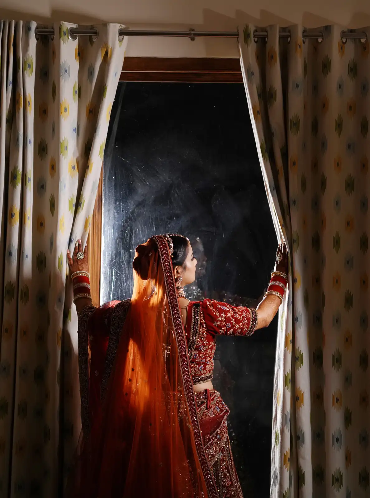 Close-up wedding portrait showcasing the couple in traditional outfits