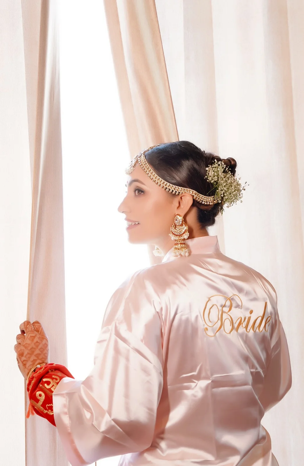 Bride captured in a close-up wedding portrait showcasing her attire