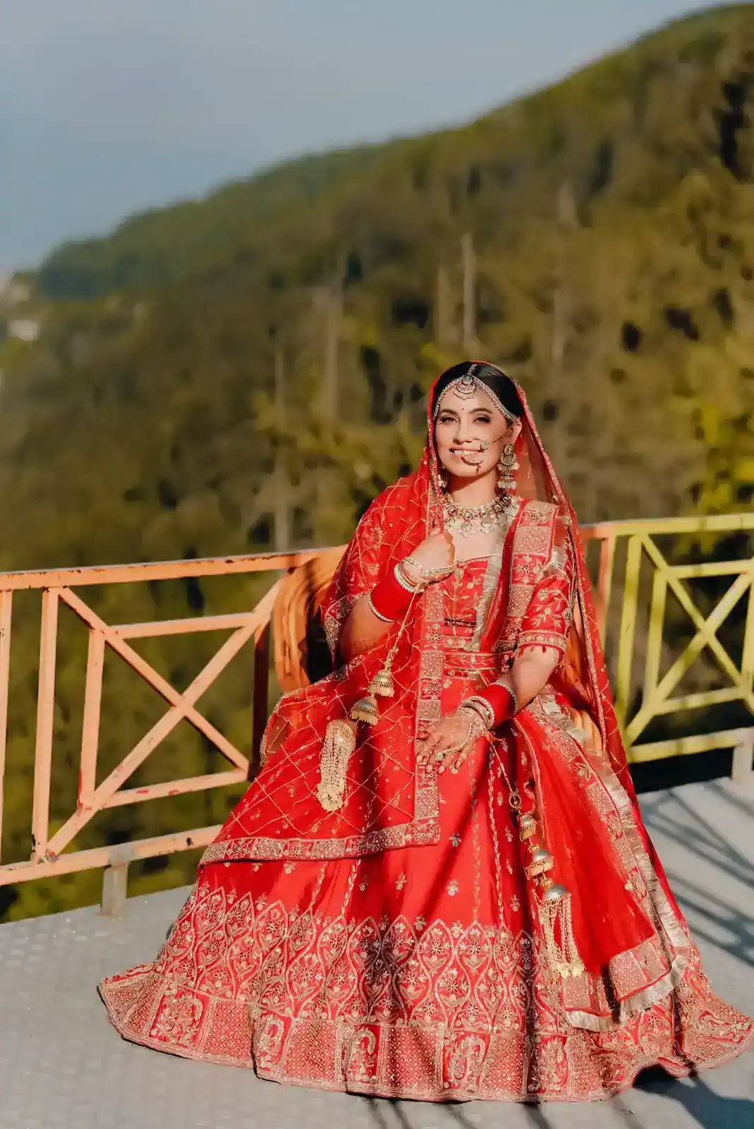 Bride and groom posing together during a traditional wedding photoshoo